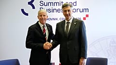 Secretary of energy Chris Wright, left, is welcomed by Croatian Prime Minister Andrej Plenkovic at the Three Seas Initiative summit in Dubrovnik, Croatia, April 28, 2026/