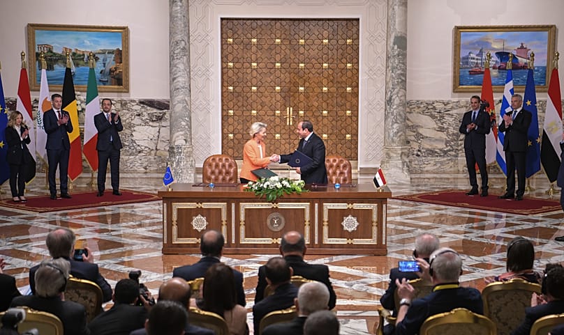 Egyptian President Abdel-Fattah el-Sissi shakes hands with European Commission President Ursula von der Leyen at at the Presidential Palace in Cairo, 17 March 2024