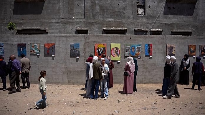 Young Palestinian artists in Gaza showcase war experiences through outdoor exhibition