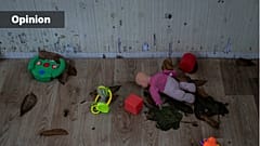 Toys and a doll lay on the floor of a playhouse in the courtyard of Kherson regional children's home in Kherson, southern Ukraine, Friday, Nov. 25, 2022