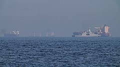 An Emirati patrol boat, second from right, is near a tanker anchored in the Gulf of Oman near the Strait of Hormuz, near Khor Fakkan, United Arab Emirates, Friday, 1 May, 2026