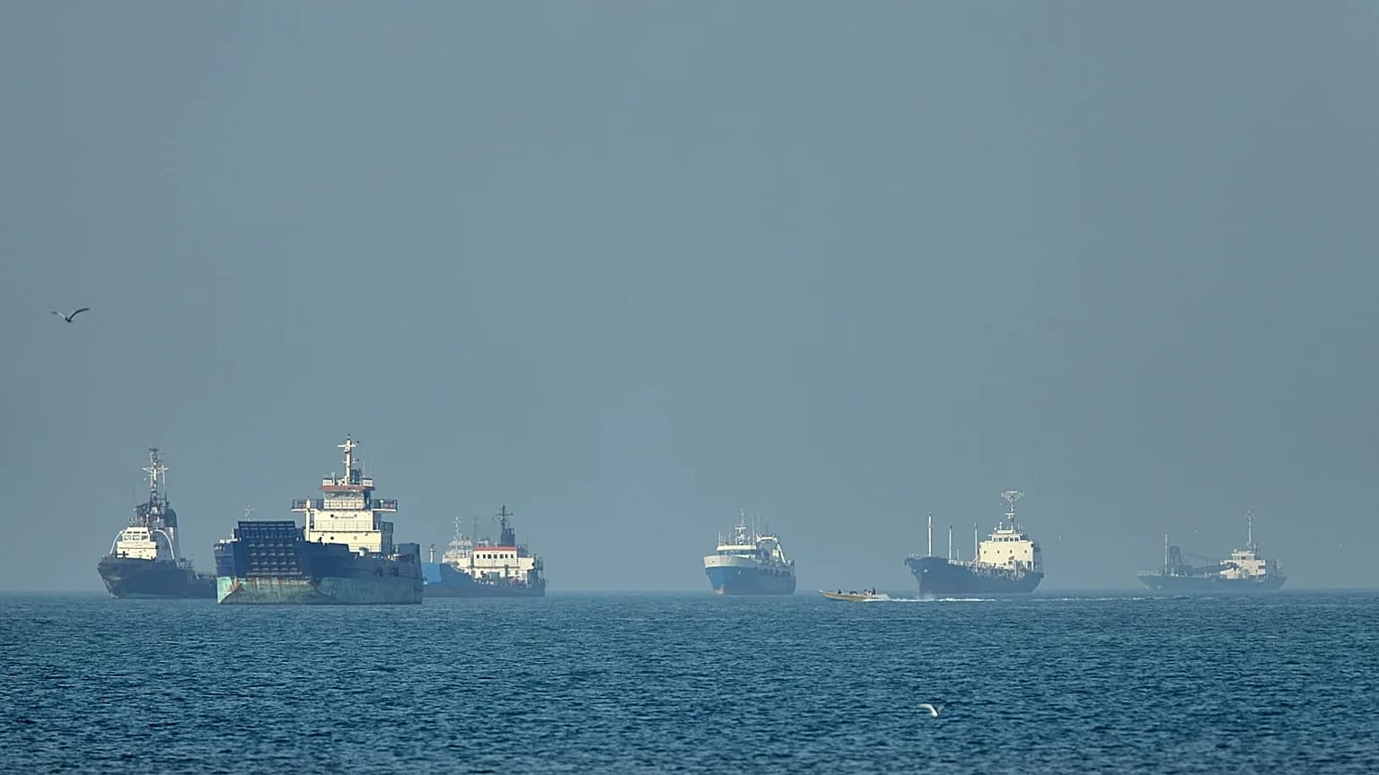Container ships sit at anchor in the Strait of Hormuz off Bandar Abbas, 4 May, 2026