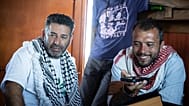Saif Abukeshek and Thiago Ávila on the Greenpeace vessel Arctic Sunrise in the Mediterranean Sea, 18 April, 2026