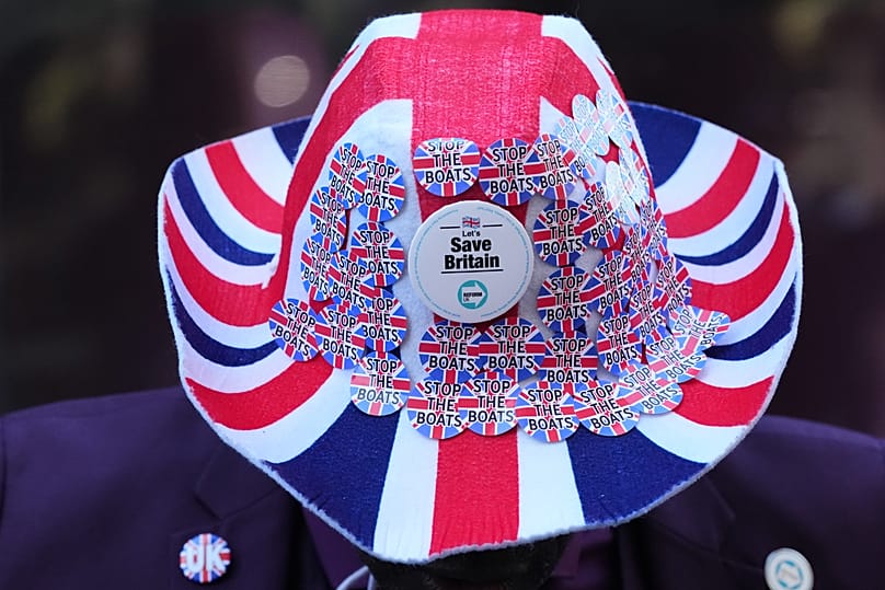 The hat worn by a Reform UK campaigner at a national fuel tax protest in London, 27 April, 2026