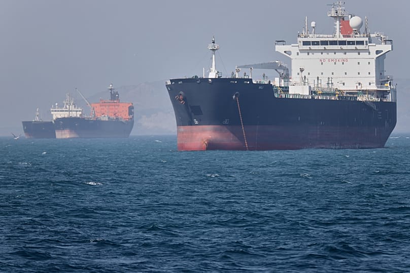Oil tankers sit at anchor offshore in the Strait of Hormuz off Bandar Abbas, 2 May, 2026