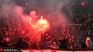 PSG's fans cheer for their team during the Champions League semifinal second leg soccer match between Bayern Munich and Paris Saint Germain in Munich, Germany