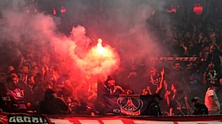 PSG's fans cheer for their team during the Champions League semifinal second leg soccer match between Bayern Munich and Paris Saint Germain in Munich, Germany