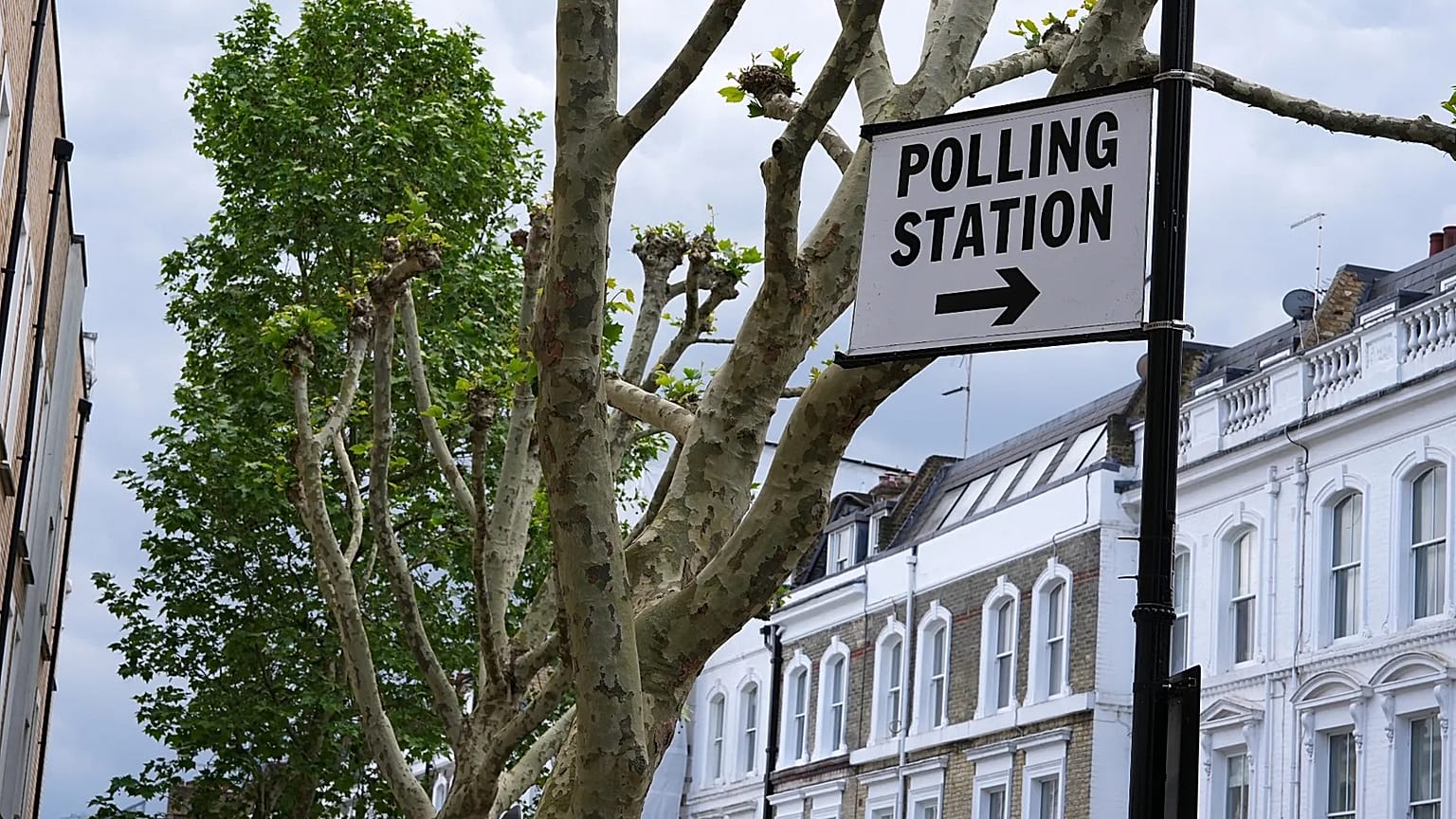 A signpost to a polling station in London, 7 May, 2026