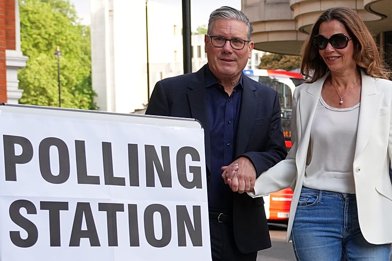 Britain's Prime Minister Keir Starmer and wife Victoria arrive at a polling station in central London, 7 May, 2026 