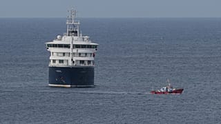 The MV Hondius cruise ship is anchored at a port in Praia, Cape Verde, Wednesday, 6 May 2026.
