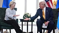 President Donald Trump and European Commission President Ursula von der Leyen shake hands after reaching a trade deal in Turnberry, Scotland, on July 2025