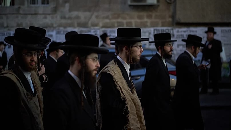 Ultra-Orthodox Jewish men in the Jerusalem neighbourhood of Mea Shearim.