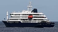 Le navire de croisière MV "Hondius" quitte le port de Praia, au Cap-Vert, le mercredi 6 mai 2026.