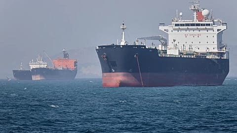 Oil tankers sit at anchor offshore in the Strait of Hormuz off Bandar Abbas, Iran, 2 May 2026