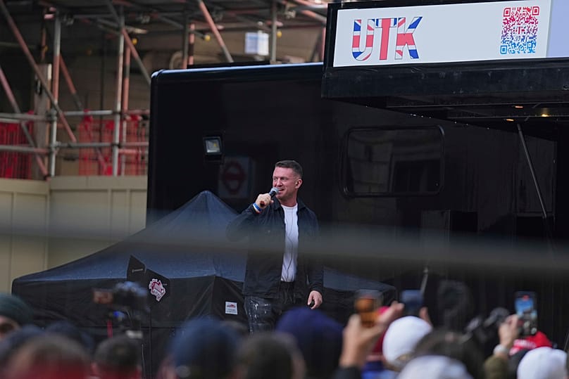 FILE - Tommy Robinson speaks during the Unite the Kingdom march and rally, London, 13 September 2025