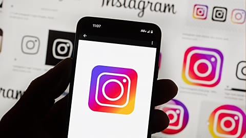 The Instagram logo is seen on a cell phone in Boston, Oct. 14, 2022.