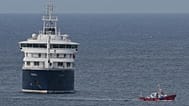The MV Hondius cruise ship is anchored at a port in Praia, 6 May, 2026