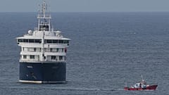 The MV Hondius cruise ship is anchored at a port in Praia, 6 May, 2026