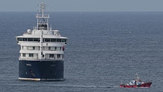 The MV Hondius cruise ship is anchored at a port in Praia, 6 May, 2026