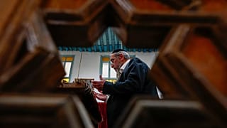 FILE: Rabbi Yusuf Hamra prays at the al-Franj synagogue where he used to serve as a rabbi in the old city of Damascus, 18 February 2025