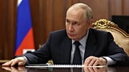 Russian President Vladimir Putin chairs a meeting with members of the Security Council via videoconference at the Kremlin in Moscow, Russia, Friday, May 8, 2026. 