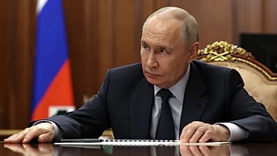 Russian President Vladimir Putin chairs a meeting with members of the Security Council via videoconference at the Kremlin in Moscow, Russia, Friday, May 8, 2026. 