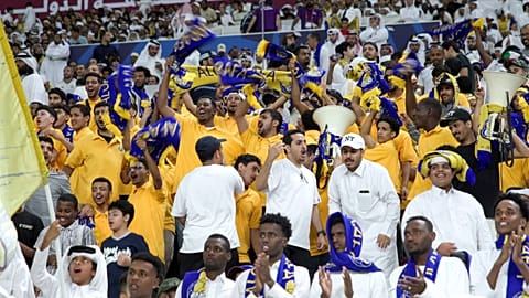 Les supporteurs d’Al Gharafa célèbrent lors de la finale de la Coupe de l’Émir au stade international Khalifa.