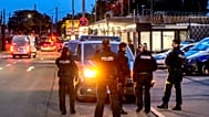 Polizeibeamte stehen am Grenzübergang zwischen Deutschland und Frankreich in Kehl, Deutschland, am Montag, dem 16. September 2024