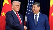 FILE - President Donald Trump and Chinese President Xi Jinping shake hands before their meeting at Gimhae International Airport in Busan, South Korea, Oct. 30, 2025.
