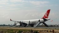 A Turkish Airlines aircraft is seen after passengers were safely evacuated and Nepal's main airport shut down in Kathmandu, 11 May, 2026