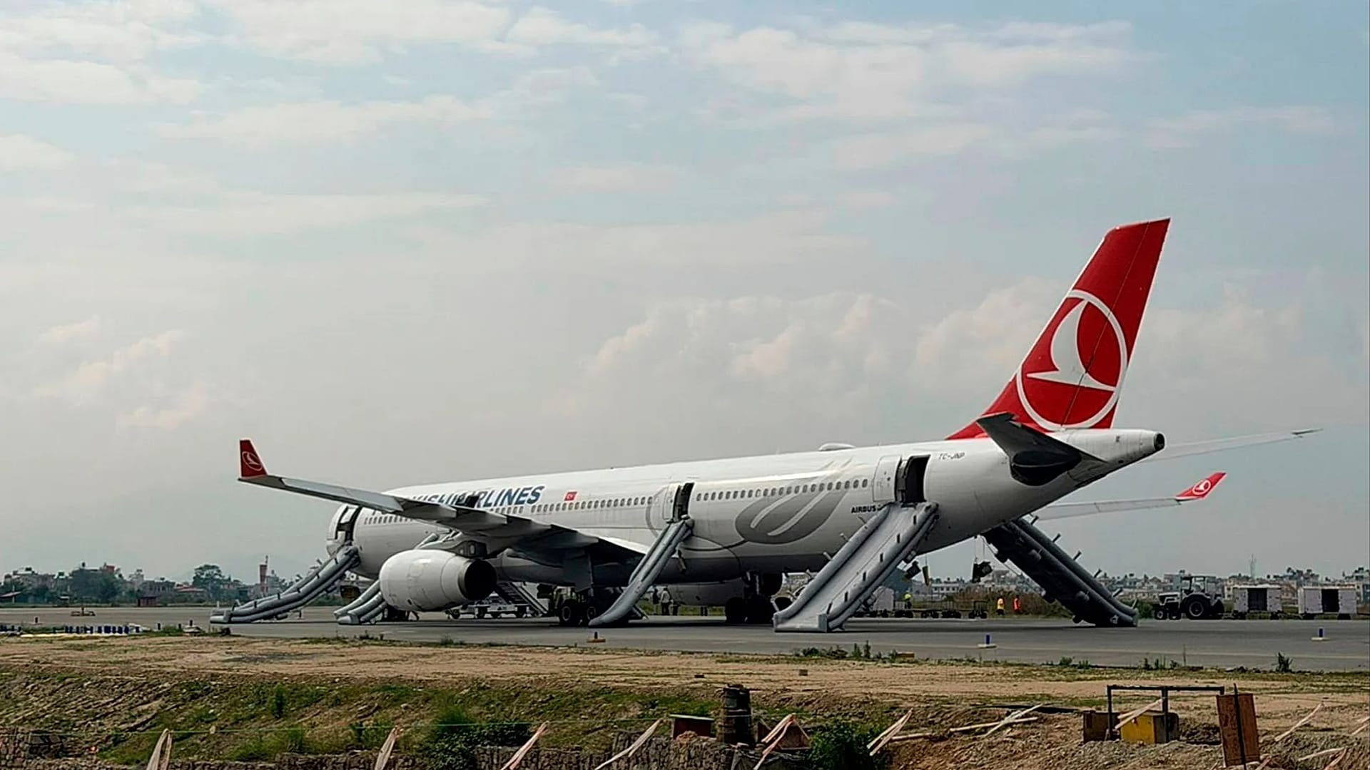 Video. Turkish Airlines plane evacuated after landing gear fire in ...