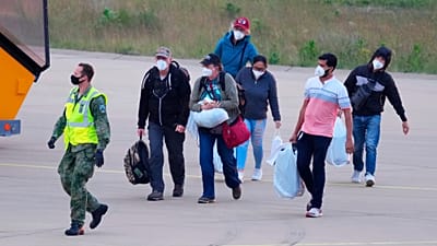 Passengers evacuated from the hantavirus-stricken cruise ship MV Hondius arrive at Eindhoven airport, Netherlands, Sunday, May 10, 2026. 