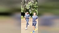 France's President Emmanuel Macron Macron and Kipchoge running alongside security detail in Kenya