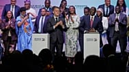 France's President Emmanuel Macron, left, and Kenya's President William Ruto, right, participate in the youth session "Africa Forward, Creation in Motion" 