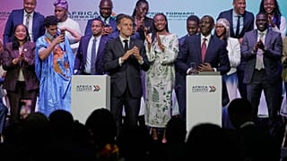 France's President Emmanuel Macron, left, and Kenya's President William Ruto, right, participate in the youth session "Africa Forward, Creation in Motion" 