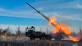 FILE - A Russian self-propelled multiple rocket launchers fires towards Ukrainian positions. Friday, March 6, 2026.