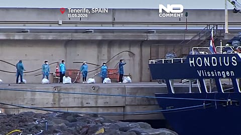 Passengers leave the MV Hondius following the hantavirus outbreak in Tenerife, Spain, 11 May 2026.