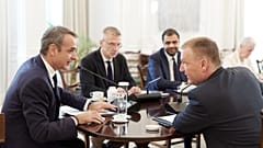 Kyriakos Mitsotakis i komisarz Michael McGrath