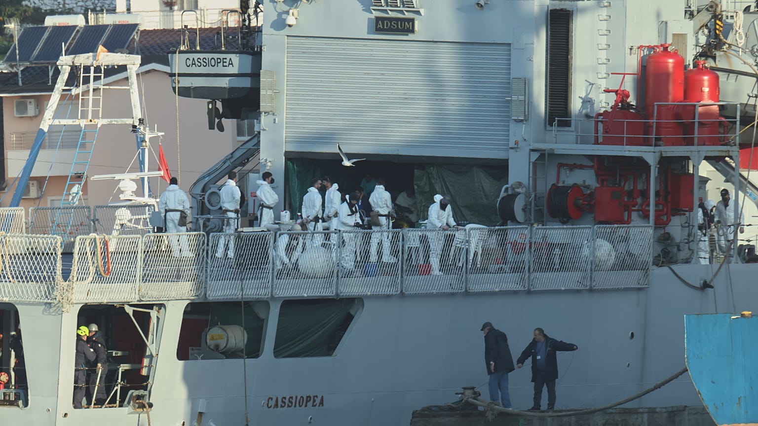 An Italian navy ship docks, as Italy sends 49 more migrants to Albania for processing following earlier court rejections, in the port of Shengjin, northwestern Albania, Tuesda