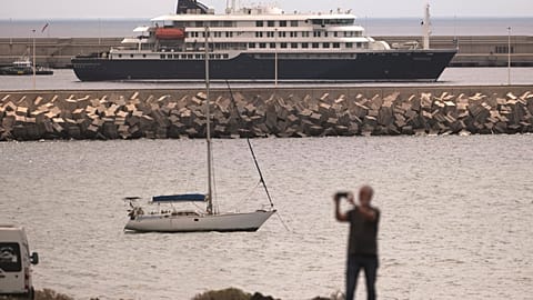 The hantavirus-stricken cruise ship MV Hondius is seen at anchor at the port of Granadilla in Tenerife, Canary Islands, Spain, Monday, May 11, 2026.
