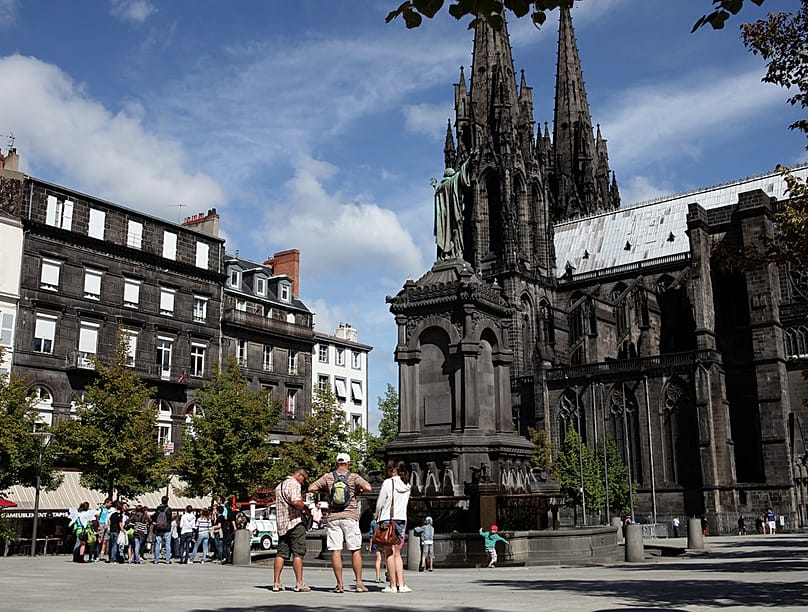 Clermont-Ferrand is known for its dark coloured buildings made using volcanic stone