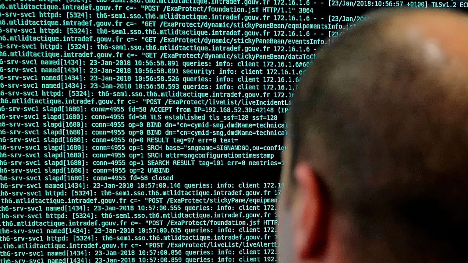 A French solider watches code lines on his computer at the defence ministry, 23 January, 2018 
