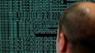 A French solider watches code lines on his computer at the defence ministry, 23 January, 2018 