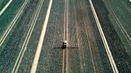 A farmer fertilises a field in the outskirts of Frankfurt, Germany, Wednesday, May 21, 2025.
