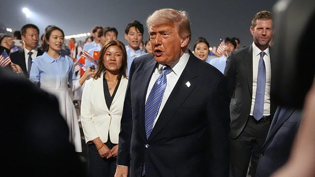 Trump arrives in Beijing for high-stakes summit with Xi