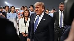 US President Donald Trump walks during an arrival ceremony at Beijing Capital International Airport in Beijing, 13 May, 2026