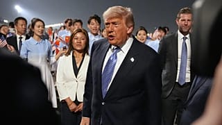 US President Donald Trump walks during an arrival ceremony at Beijing Capital International Airport in Beijing, 13 May, 2026