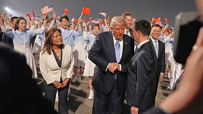 President Donald Trump shakes hands during a welcome ceremony Wednesday, May 13, 2026, at Beijing Capital International Airport in Beijing. 