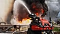 Emergency services personnel work to extinguish a fire following a Russian drone attack on a gas pipeline in Dnipropetrovsk region, 13 May, 2026