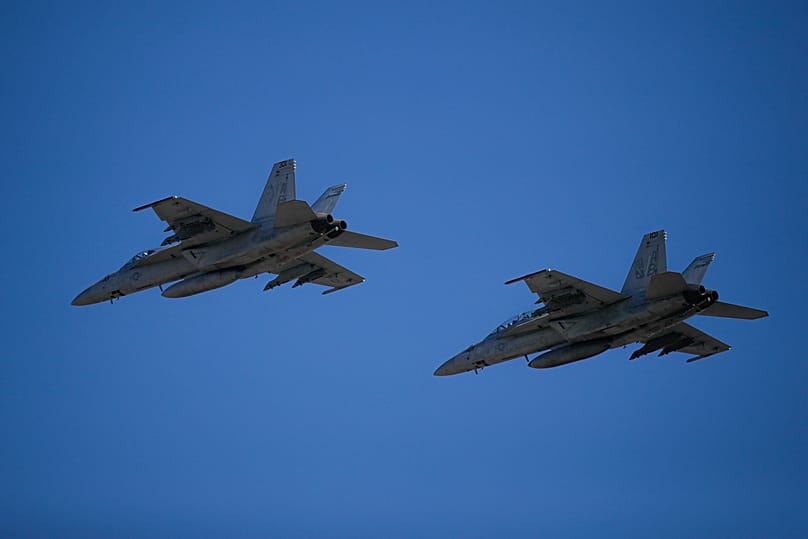 FILE: US Navy fighter jets fly by at the Mihail Kogalniceanu airbase, near the Black Sea port city of Constanta, 11 February 2022
